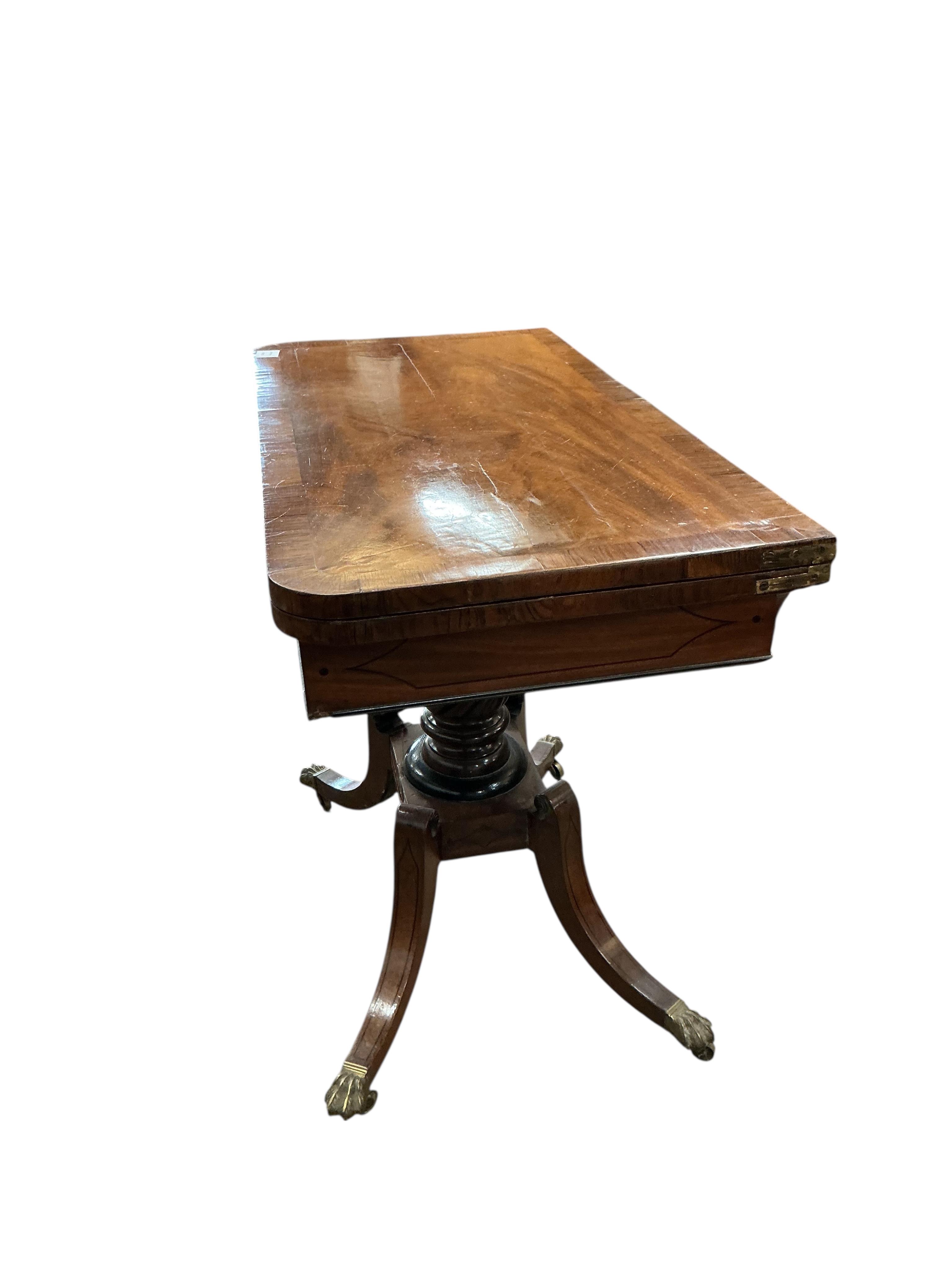 A Regency rosewood banded rectangular mahogany folding card table, width 91cm, depth 45cm, height 73cm